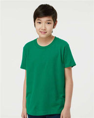 A young boy wearing a Tultex Youth Fine Jersey T-Shirt made with USA cotton.