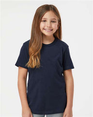 A young girl wearing a Tultex Youth Fine Jersey T-Shirt, made of 100% USA cotton.
