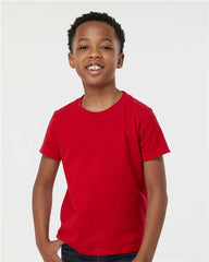 A young boy wearing a Tultex Youth Fine Jersey T-Shirt made from USA cotton.