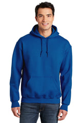 A man wearing a Gildan - DryBlend Pullover Hoodie Sweatshirt 12500 made of a moisture-wicking cotton blend.