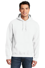 A man wearing a white Gildan - DryBlend Pullover Hoodie Sweatshirt 12500 made from a cotton blend.