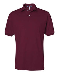 A plain maroon short-sleeve JERZEES Midweight Polo Cotton Poly Blend SpotShield 50/50 shirt with a collar and two buttons.