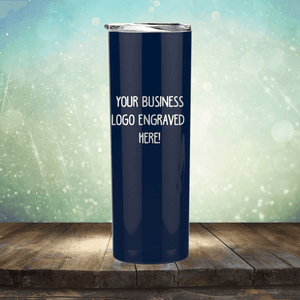 Blue stainless steel tumbler with customizable logo space displayed on a wooden surface against a bokeh background from Kodiak Coolers' SECOND CHANCE SALE - Custom Engraved Drinkware - SPECIAL 72 HOUR SALE PRICING - Single Side Engraving Included in Price.