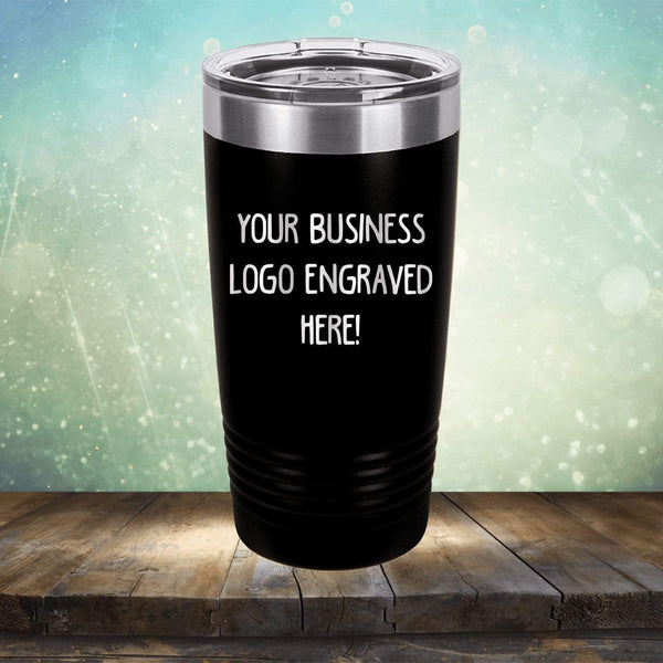 Promotional black tumbler with business logo engraved Kodiak Coolers, displayed against a bokeh background.
