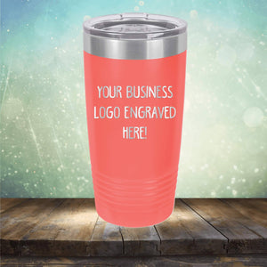 Promotional red insulated tumbler with space for custom printed with logo, displayed on a wooden surface against a bokeh background. 
Product Name: Kodiak Coolers Custom Logo 20 oz Tumblers - SPECIAL OFFER - Front side Logo Included