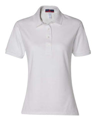 A women's white Jerzees Semi-Fitted Polo Spotshield 50/50 made with SpotShield fabric, ensuring a clean finished look. This shirt is crafted from a comfortable blend of cotton/polyester.
