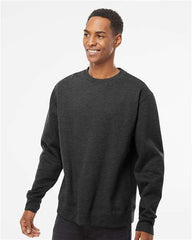 A man wearing an Independent Trading Co. Midweight 100% Cotton Crewneck Sweatshirt SS3000, made of cotton/polyester blend fleece.
