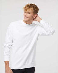 A man wearing an Independent Trading Co. Midweight 100% Cotton Crewneck Sweatshirt (SS3000) made of cotton/polyester blend fleece.