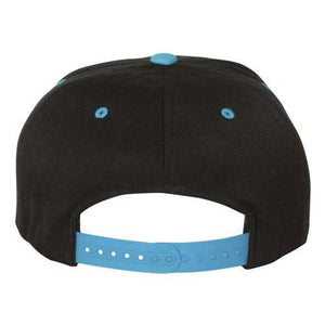 An Flexfit 110 Flat Bill snapback hat with a structured six-panel design, featured in black and blue colors on a white background.