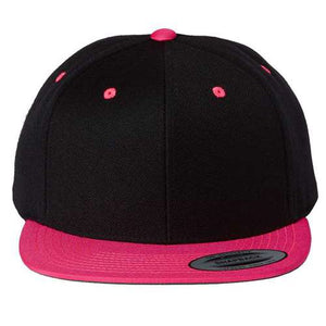 A black YP Classics Premium Flat Bill Snapback Cap with a pink accent, resting on a white background.