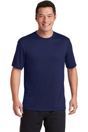 Man wearing a Hanes Cool Dri Performance T-Shirt 4820, a navy blue, short-sleeve lightweight fabric design by Hanes, and black pants, smiling at the camera.