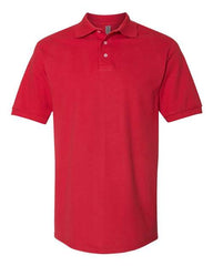 A plain red short-sleeve Jerzees 100% Ringspun Cotton Pique Polo, made of 100% ringspun cotton, with a collar and buttons, displayed against a white background by the brand JERZEES.
