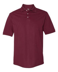 The JERZEES Jerzees 100% Ringspun Cotton Pique Polo is a maroon short-sleeved polo shirt with a collar and three buttons down the front, perfect for business apparel. Made from 100% ringspun cotton, it offers both comfort and durability.