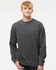 A man wearing a Customized Independent Trading Co. Midweight Pigment-Dyed Crewneck Sweatshirt and jeans makes a strong impression with his branded attire.