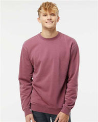 A man creating a strong impression with a customized Independent Trading Co. Midweight Pigment-Dyed Crewneck maroon sweatshirt, showcasing his unique branding.