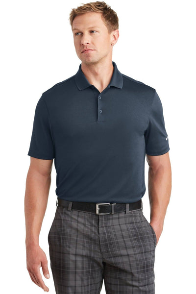 Wearing the Nike Dri-FIT Classic Fit Players Polo with Flat Knit Collar (838956) and plaid pants, this person exudes a timeless look. The classic fit creates a stylish silhouette, while the moisture-wicking fabric ensures comfort and coolness as they glance to the side.