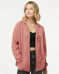 This SEO product description showcases a woman dressed in a stylish pink hoodie and jeans. The outfit features the Independent Trading Co. Women's California Wave Wash Full-Zip Hoodie Sweatshirt, perfect for casual yet trendy occasions.