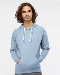 A man wearing the Independent Trading Co Icon Unisex Lightweight Loopback Terry Hoodie Sweatshirt in a light blue color.