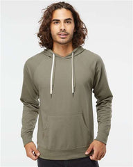 A man wearing an Independent Trading Co Icon Unisex Lightweight Loopback Terry Hoodie Sweatshirt in a green color.