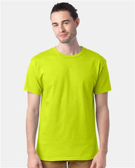 A man wearing a lime green Hanes Essential-T T-Shirt Safety made of pre-shrunk cotton.