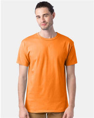 A man wearing a Hanes Essential-T T-Shirt Safety made of pre-shrunk cotton.