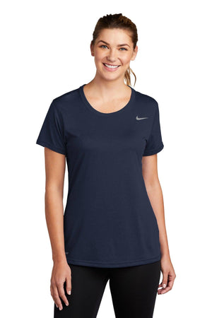 Woman wearing a Nike Ladies Legend T-Shirt CU7599 with Dri-FIT technology, smiling at the camera.