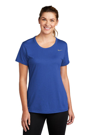 Woman in blue Nike Ladies Legend T-Shirt CU7599, smiling at the camera.