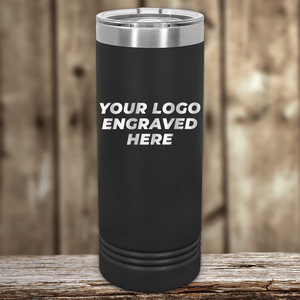 A black Kodiak Coolers tumbler with a silver lid sits on wood, featuring "YOUR LOGO ENGRAVED HERE" in white. This custom drinkware is laser engraved with your logo—no setup fee, 1 side logo included—perfect for New Years Sale promotions!.