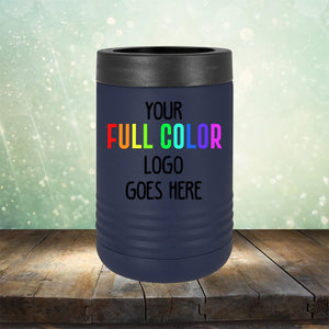 A black Custom UV Printed Drinkware - ONE TIME SPECIAL OFFER by Kodiak Coolers against a blurred, sparkly background, with the text "YOUR FULL COLOR LOGO GOES HERE" in white and colorful letters. Perfect for engraving, the tumbler stands on a wooden surface.
