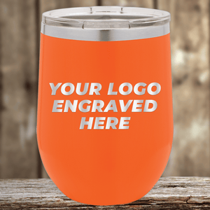 Kodiak Coolers’ orange stainless steel tumbler with clear lid, engraved with your custom company logo—perfect as Realtor closing gifts for clients or promotional drinkware.