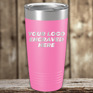 A Kodiak Coolers tumbler with a metal lid, custom engraved with your company logo, sits on a wooden surface—an ideal Realtor closing gift or addition to personalized drinkware collections.