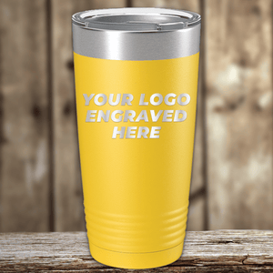 A yellow Kodiak Coolers tumbler with a metal lid displays "YOUR LOGO ENGRAVED HERE" in white, perfect as a Realtor closing gift for clients or as a standout custom company logo drinkware option.