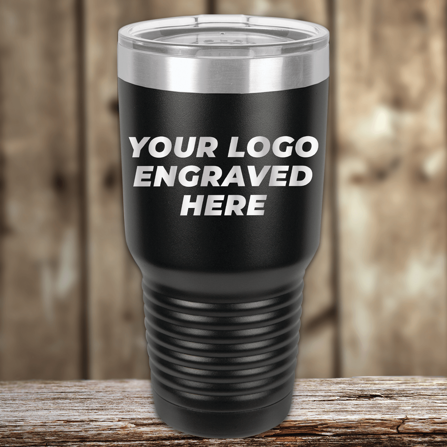 The Kodiak Coolers SAMPLE 30 oz black insulated tumbler features an engraved logo and a clear plastic lid, making it perfect custom drinkware for promotions. Price includes sample logo engraving and volume setup fee.