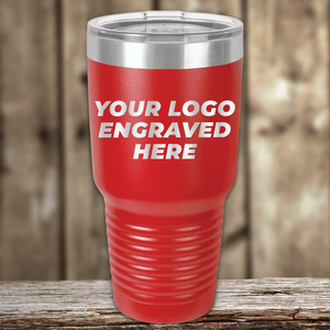 A red insulated tumbler by Kodiak Coolers with a clear lid and your custom company logo engraved—ideal as a Realtor closing gift for clients or anyone wanting stylish personalized drinkware.