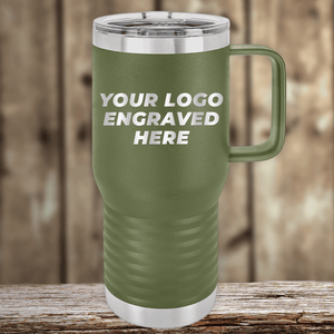 The Kodiak Coolers Realtor Closing Gift is a green travel mug with a handle and silver lid, featuring your custom company logo engraved on the front—an ideal promotional gift. Shown on wood with a blurred wooden background.