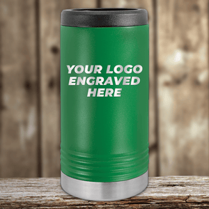 A green Kodiak Coolers stainless steel tumbler with a black lid and silver base, engraved with "YOUR LOGO ENGRAVED HERE," makes an ideal Realtor Closing Gift for clients—customize your company logo on Drinkware 2—shown on a wooden background.