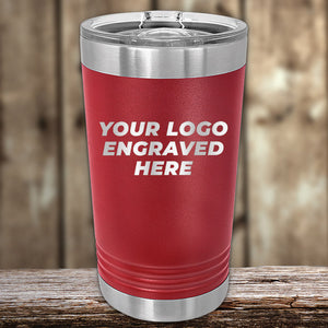 Red Kodiak Coolers Insulated Custom Pint Tumbler 16 oz with your Logo or Design Engraved displayed on wooden surface.