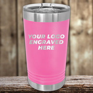 Pink Custom Pint Tumblers 16 oz with your Logo or Design Engraved - Low 6 Piece Order Minimal Sample Volume displayed against a wooden background by Kodiak Coolers.