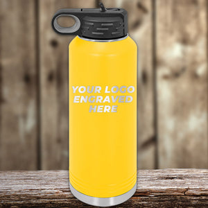 Yellow insulated Kodiak Coolers water bottle with a customizable logo space, perfect for promotional items, displayed on a wooden surface against a blurred background.