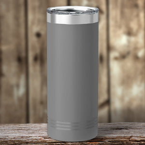 A green Custom Skinny Tumbler 22 oz with your logo laser-engraved, featuring Kodiak Coolers.