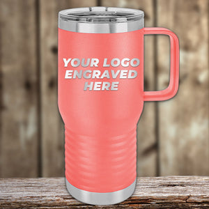 Kodiak Coolers Engraved Custom Logo Drinkware in coral with handle and silver lid, single side engraving included—ideal for business promotional gifts. Displayed on wood with a blurred background. Bulk tiered pricing available.