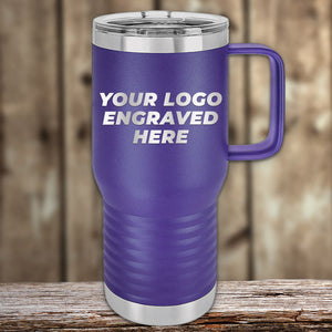 Promotional purple Kodiak Coolers custom travel tumblers with engraved logo area displayed on a wooden background.