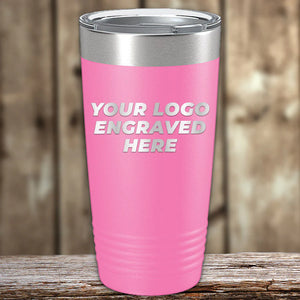 Pink Kodiak Coolers Custom Tumblers 20 oz with your Logo or Design Engraved - Special Bulk Wholesale Pricing displayed on a wooden surface.