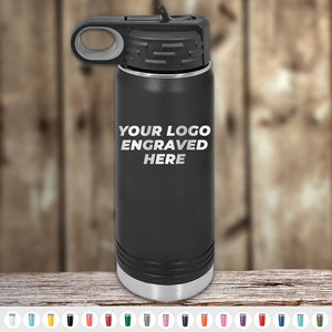A customizable Kodiak Coolers black water bottle with a message "your logo engraved here" displayed on a wooden surface, ideal as promotional drinkware.