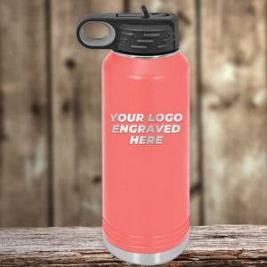 A Kodiak Coolers pink insulated water bottle with a black lid sits on a wooden surface, featuring your custom laser-engraved logo—no setup fee, 1 side included—a standout New Years Sale gift to match your personalized mugs.