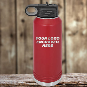 Red insulated Kodiak Coolers custom water bottle with customizable logo space on wooden surface.